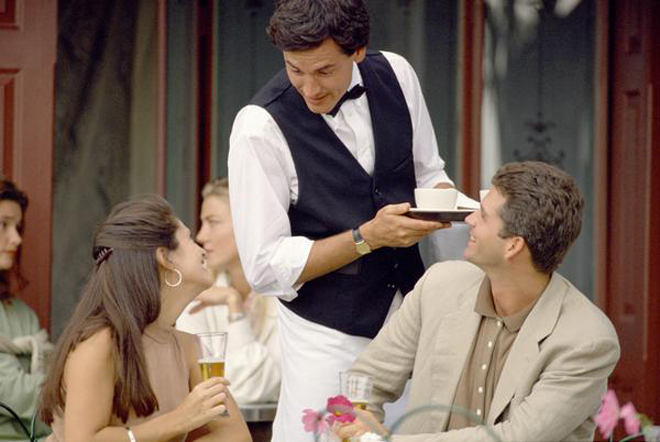 Happy restaurant server - good customer service